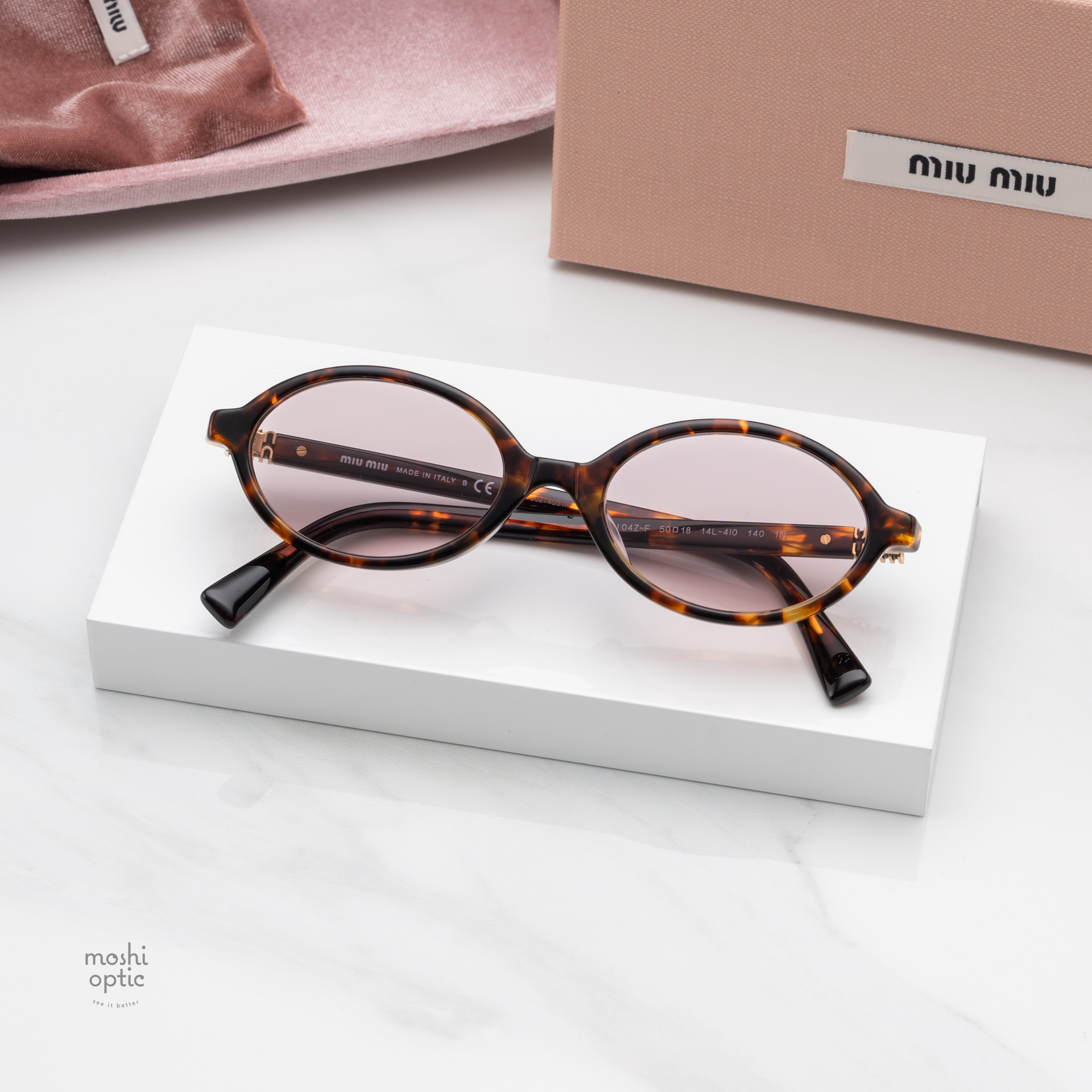แว่นกันแดด Miu Miu MU04ZSF 14L4I0