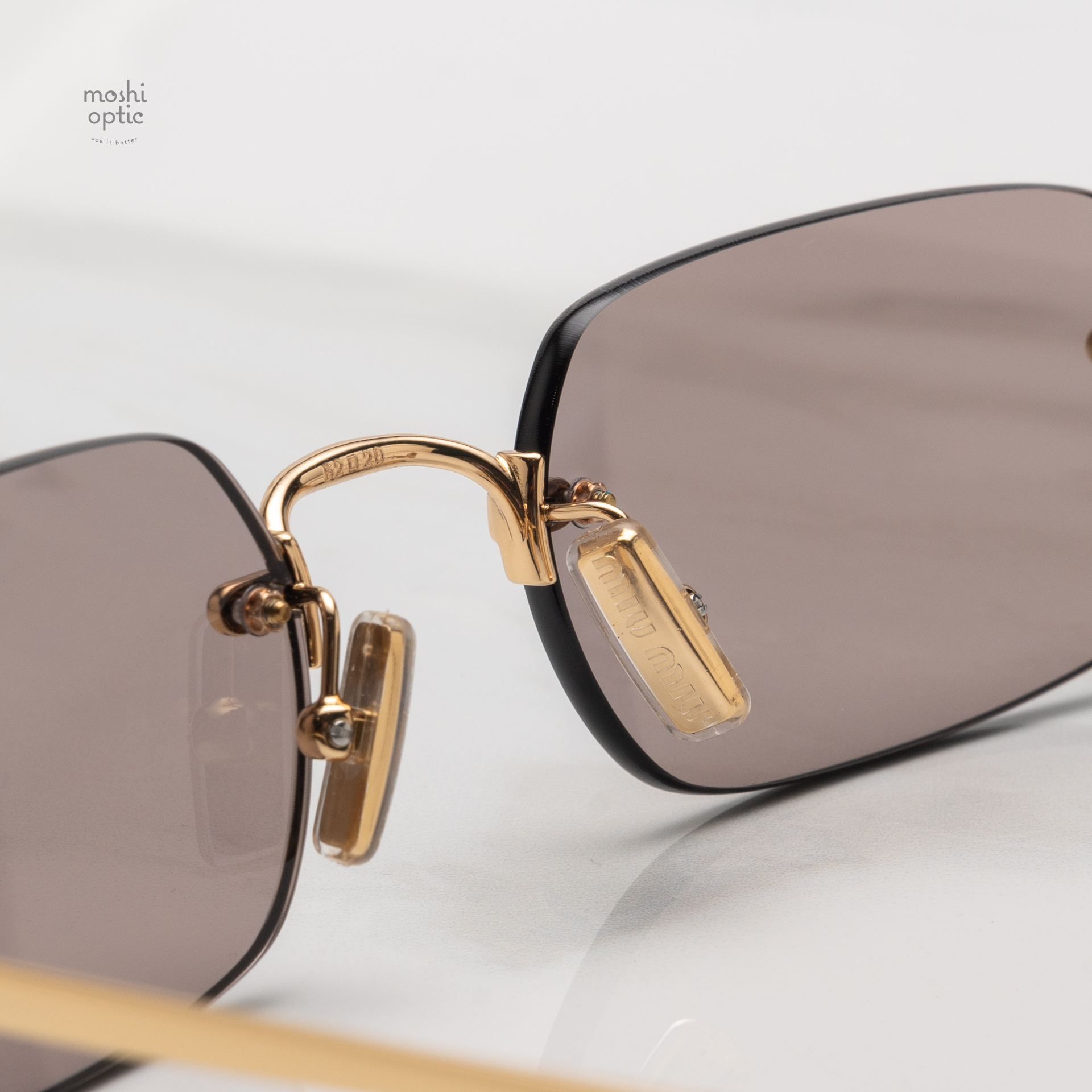 แว่นกันแดด Miu Miu MUB50S 5AK20I