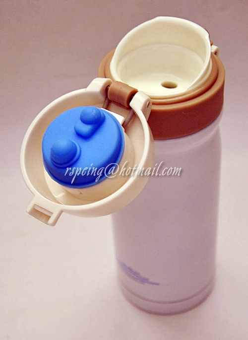 กระติกน้ำสแตนเลสสูญญากาศ-ร้อน-เย็น สีขาว Counter Service