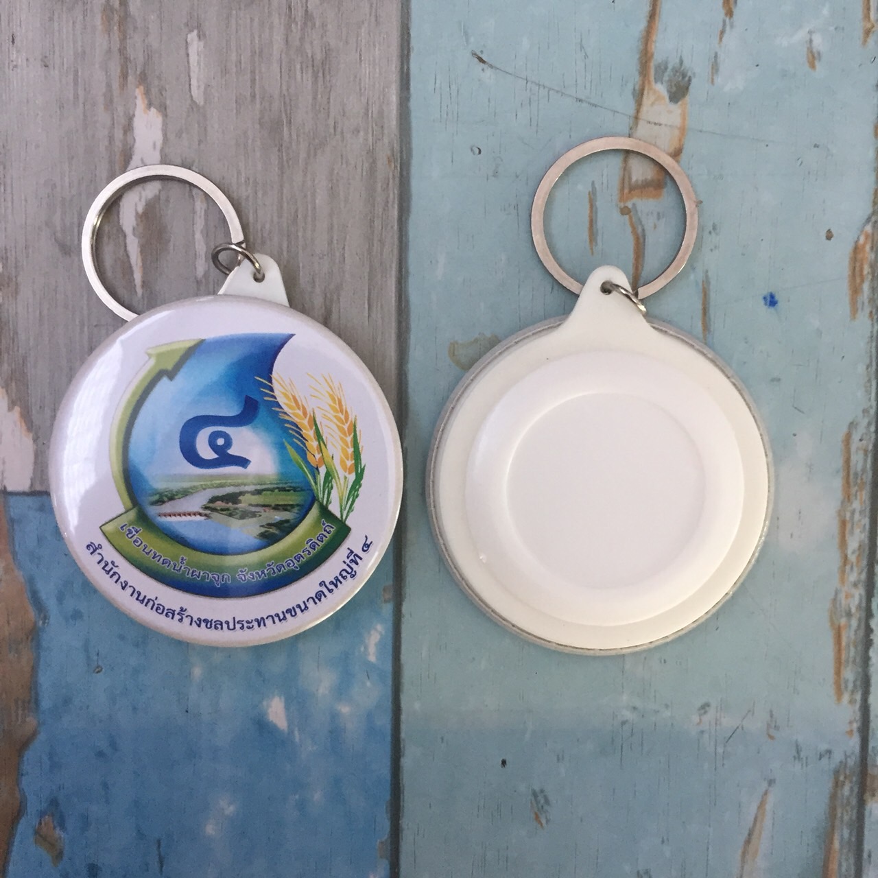 พวงกุญเเจพลาสติกวงกลม รับผลิตพวงกุญแจสกรีนลายโลโก้