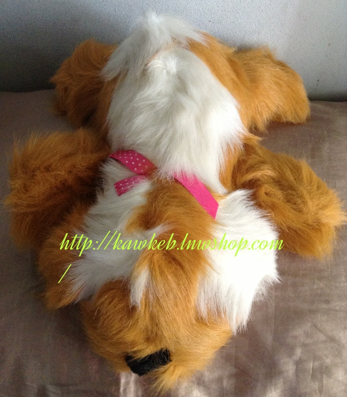 ตุ๊กตาหมาชิสุห์ในท่าหมอบพังพาบ ขนปรกตา