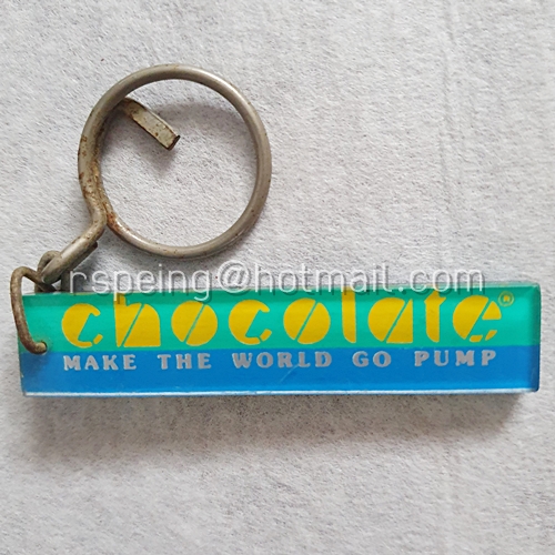 พวงกุญแจอะคริลิค Chocolate : Make The World Go Pump สีเขียวฟ้า