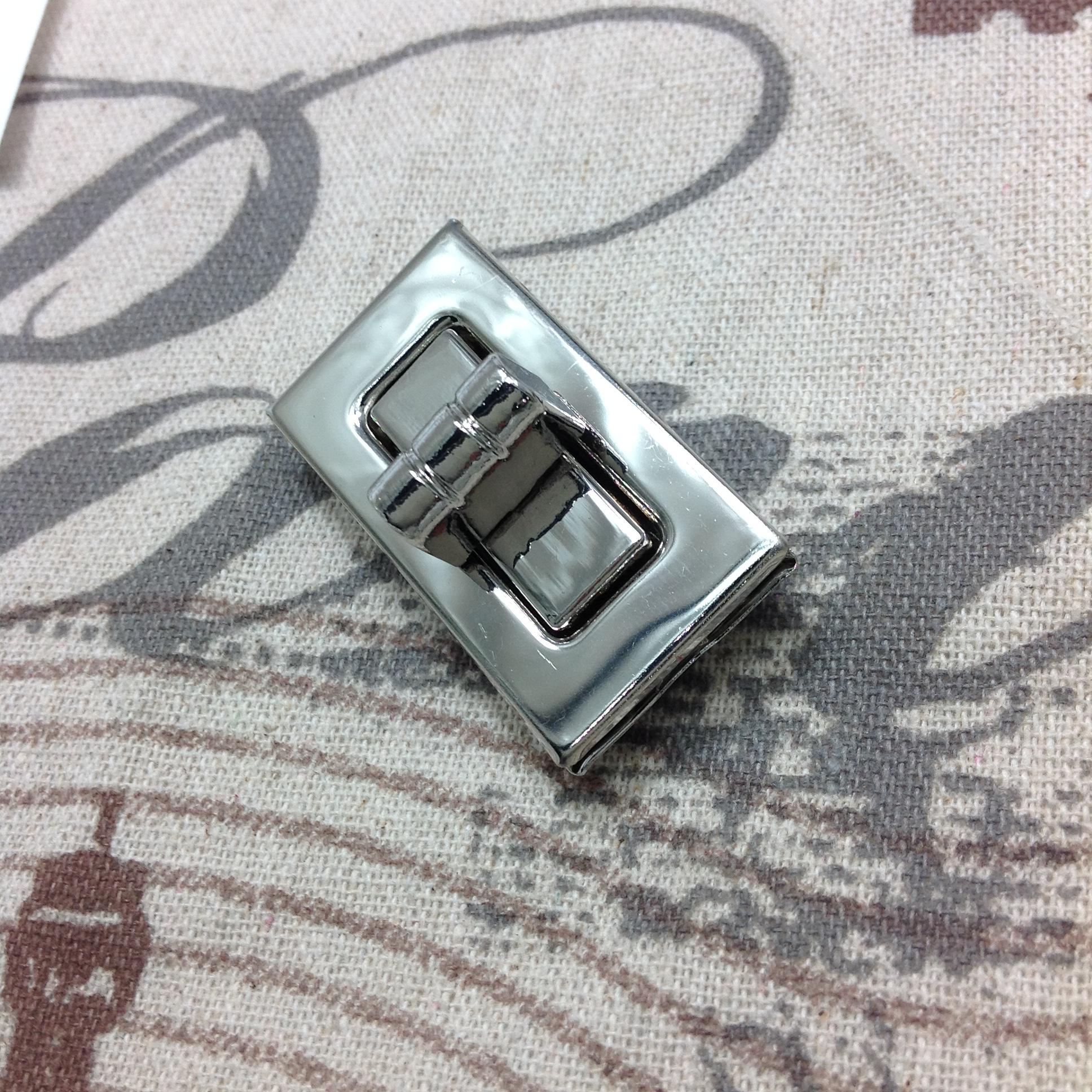 หน้ากระเป๋าตัวหนอน เงิน