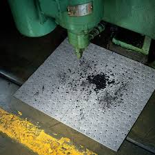 Oil absorbent mats