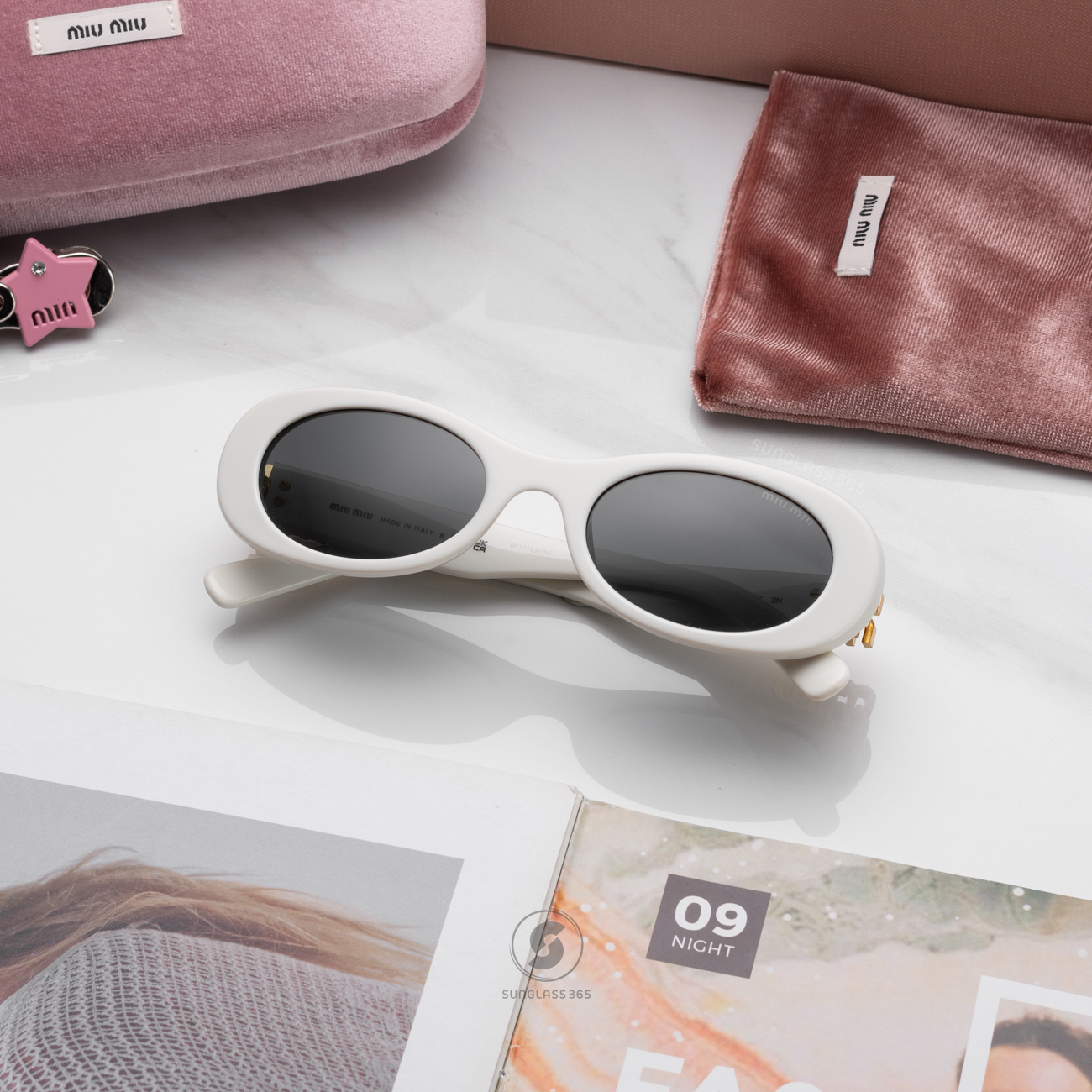 แว่นกันแดด Miu Miu MU06ZS 1425S0