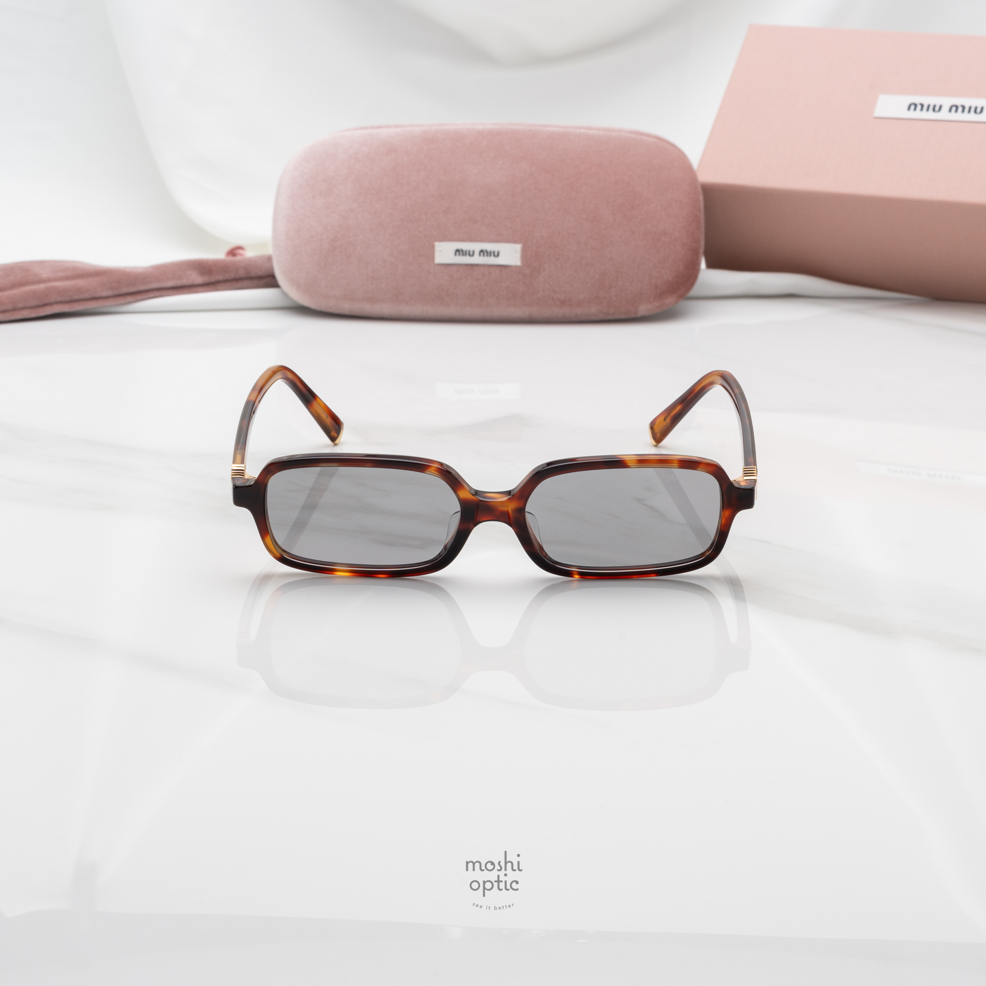 แว่นกันแดด Miu Miu MU11ZSF 21C40O