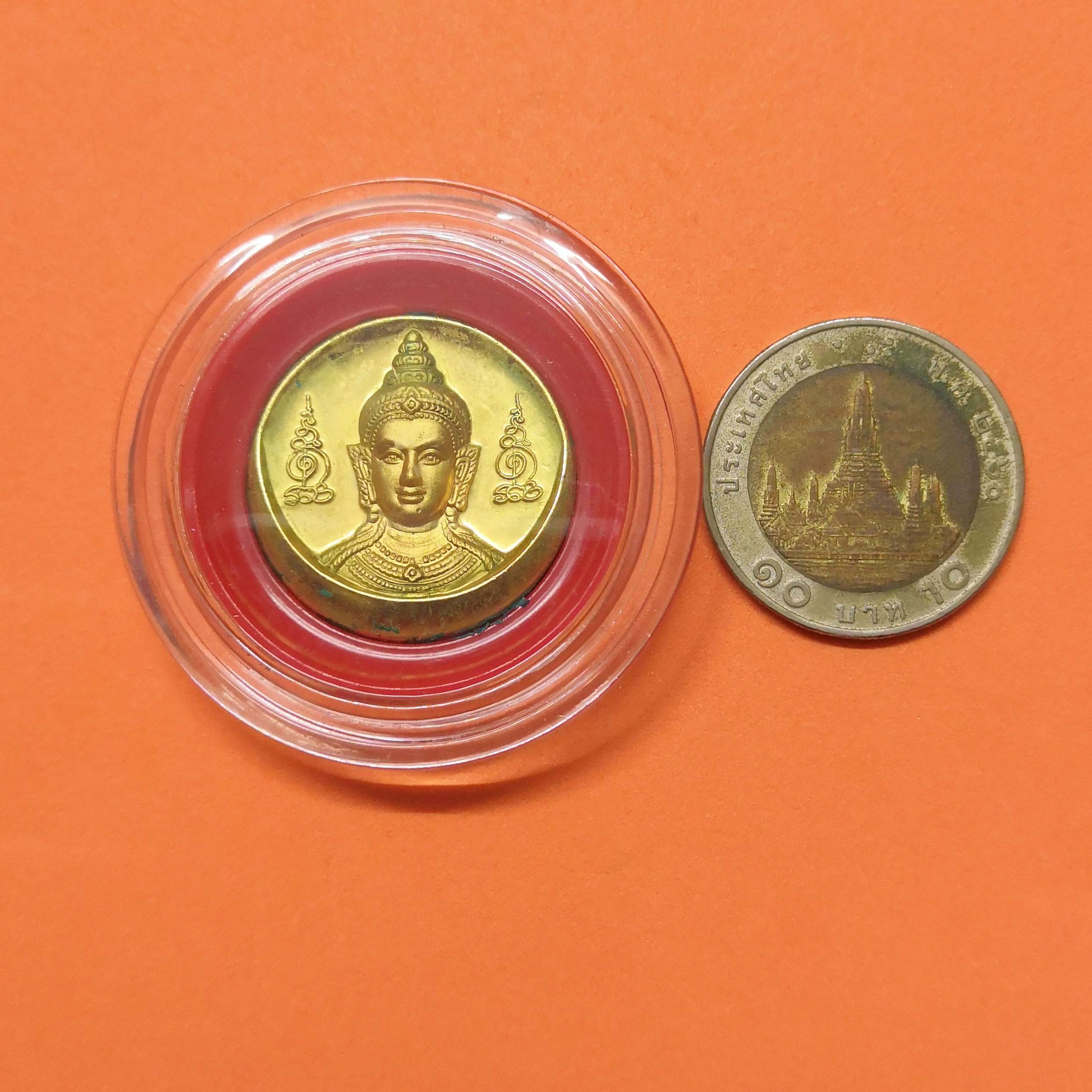 เหรียญพิมพ์เล็ก จตุคาม รามเทพ รุ่น โคตรรวย วัดโคกโพธิ์สถิตย์ จ.นครศรีธรรมราช ปี 2550 เนื้อกะไหล่ทอง ขนาด 2.5 เซน