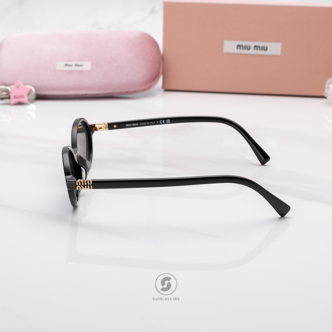 แว่นกันแดด Miu Miu MU04ZSF 1AB5S0