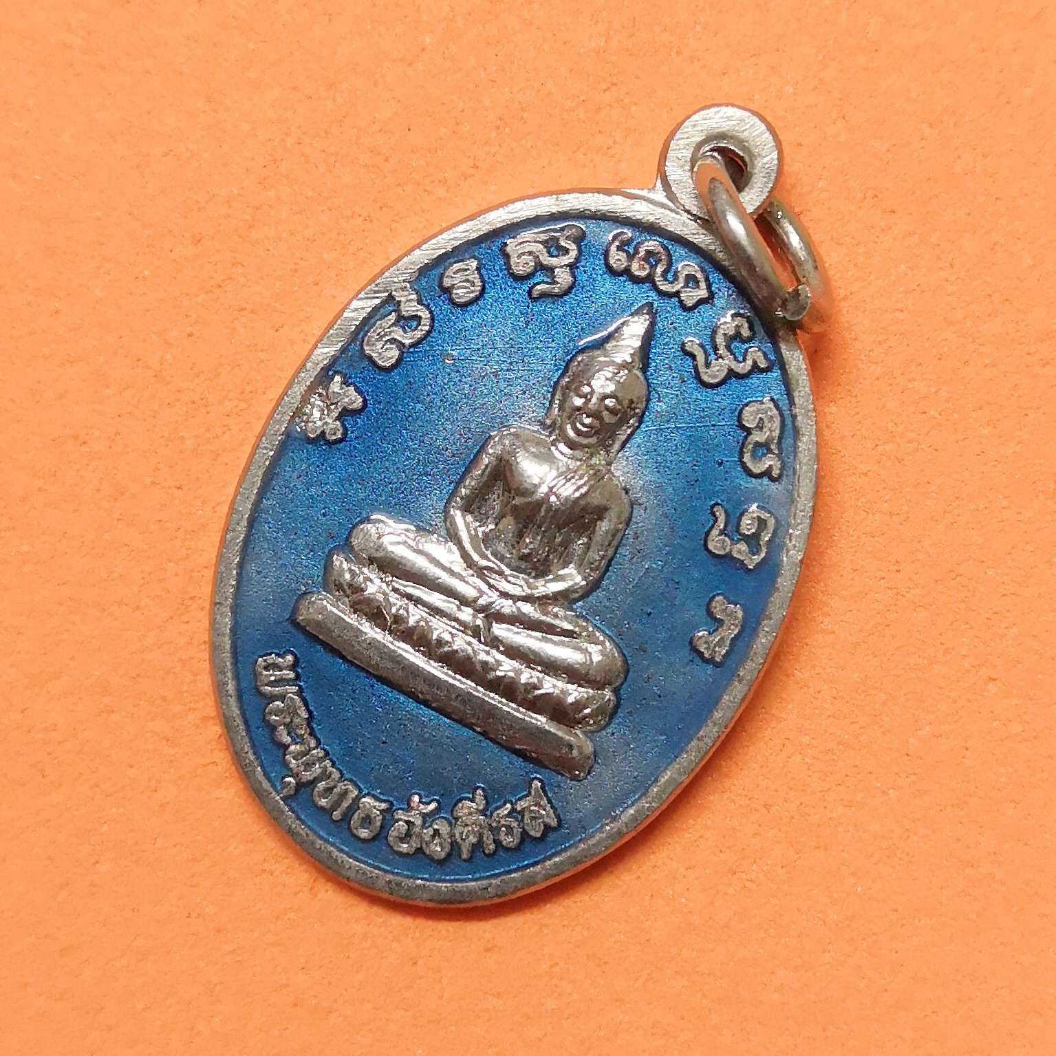 เหรียญ พระพุทธอังคีรส สร้างเพื่อเป็นสิริมงคลงานปีใหม่-งานกาชาด จังหวัดระยอง ปี 2535 เนื้อกะไหล่เงินลงยา สูง 2.5 เซน