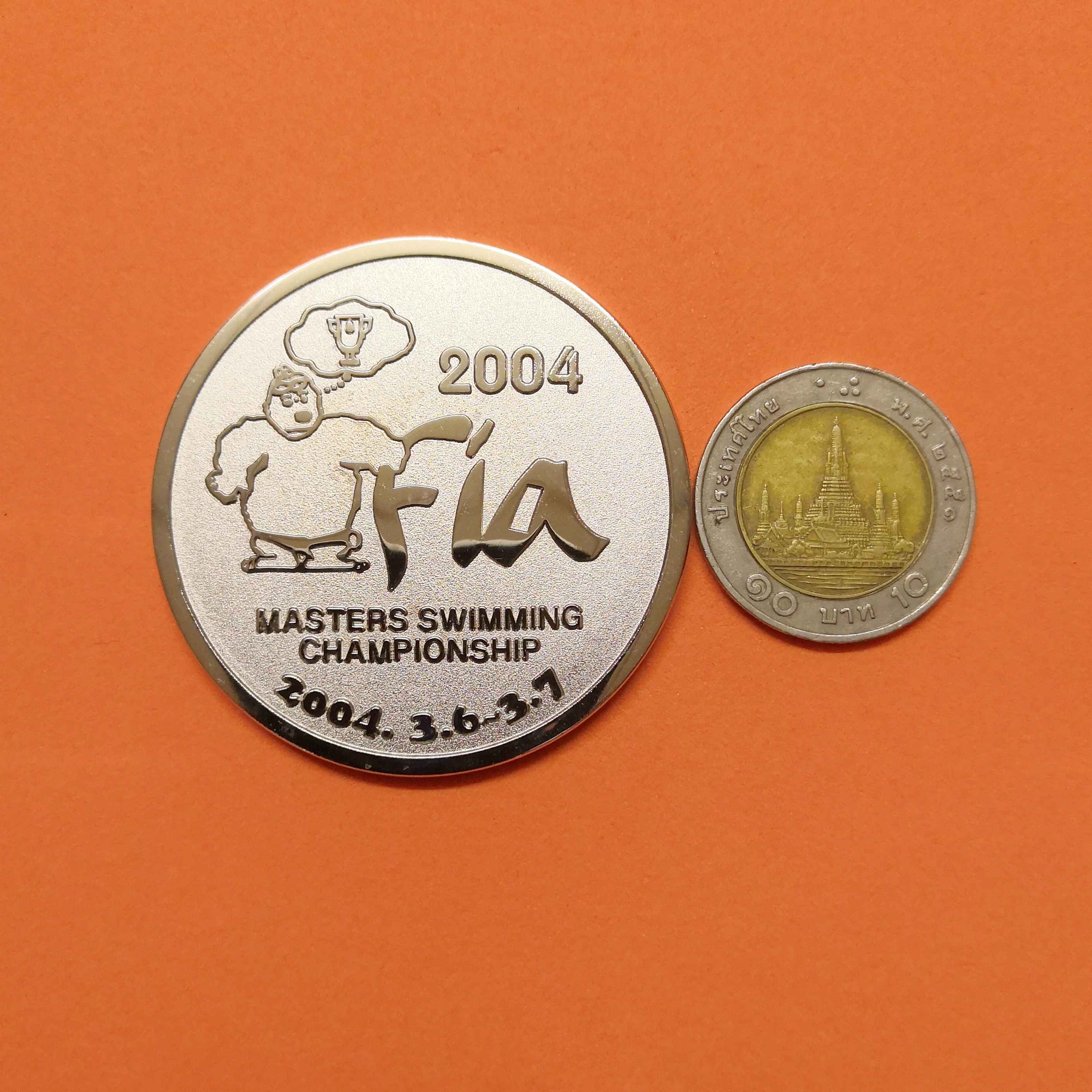 เหรียญที่ระลึก การแข่งขันกีฬาว่ายน้ำ Masters Swimming Championships 2004 เนื้อโลหะ ขนาด 4.9 เซน