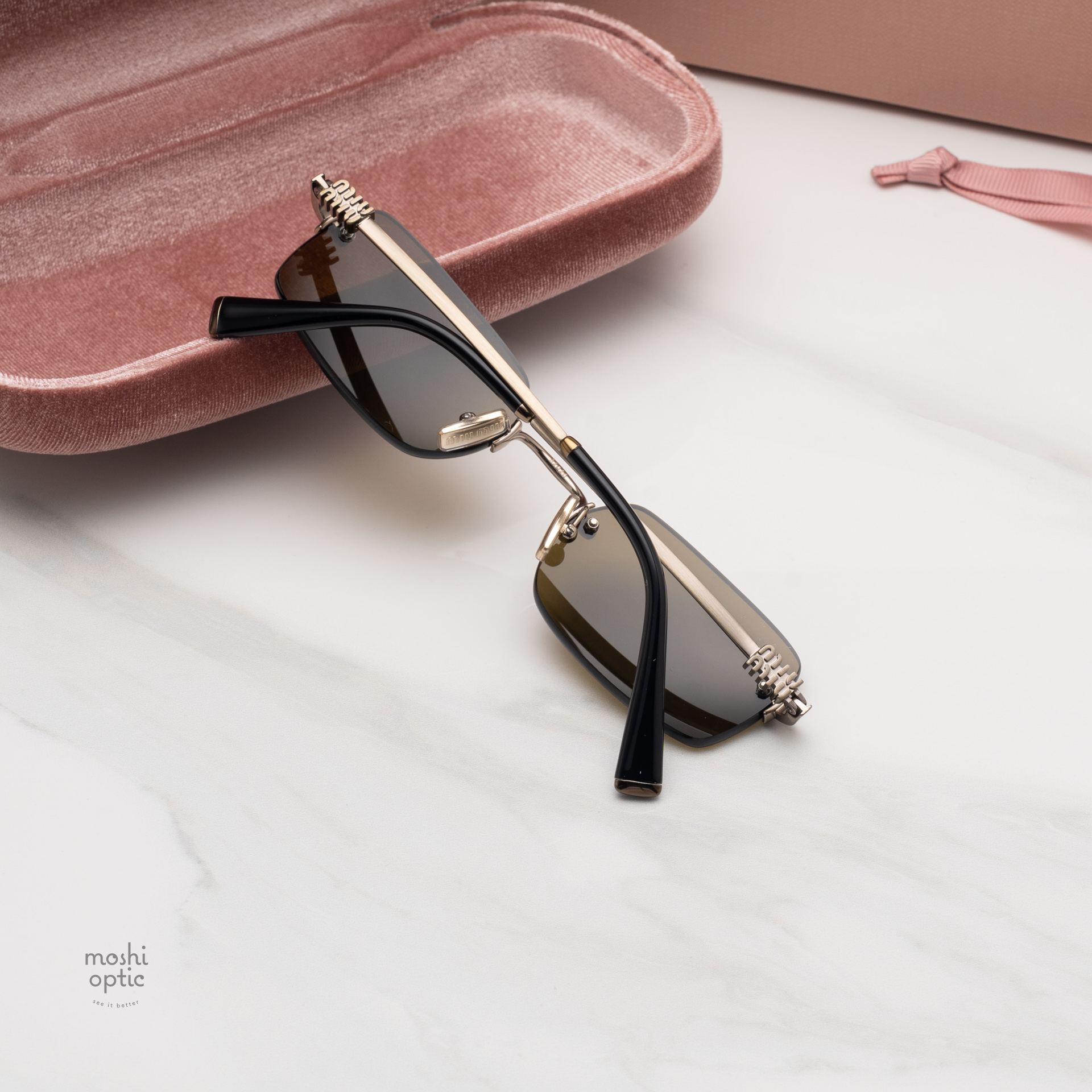 แว่นกันแดด Miu Miu MUB50S 26C09Z