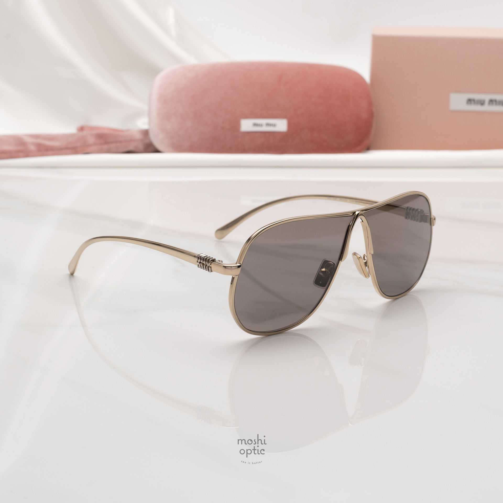 แว่นกันแดด Miu Miu MUA56S ZVN80Q