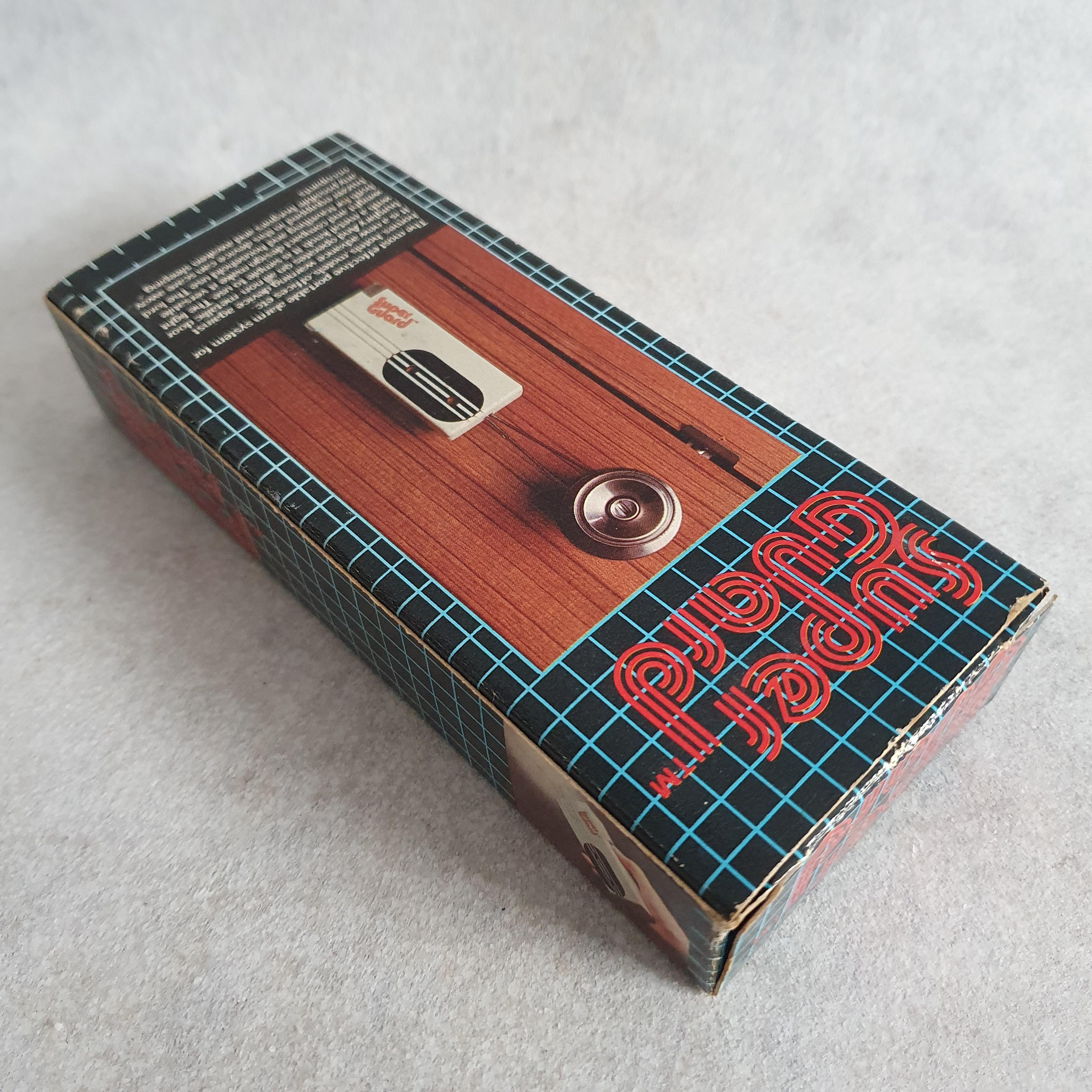 เครื่องเตือนกันขโมยวินเทจ Super Guard (ไฟฉายใช้ไม่ได้)