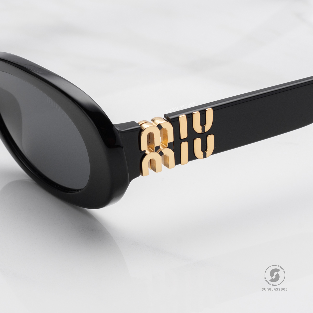 แว่นกันแดด Miu Miu MU06ZS 1AB5S0