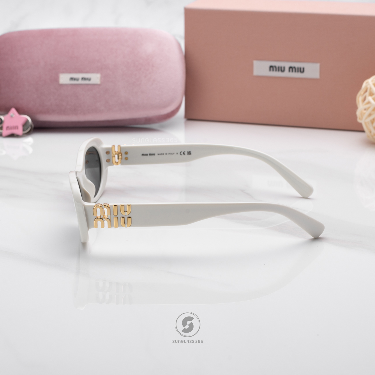 แว่นกันแดด Miu Miu MU06ZS 1425S0