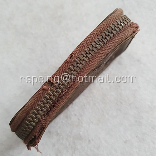 กระเป๋าพวงกุญแจหนังเก่า บริษัท สหเวชชภัณฑ์ประกันภัย จำกัด