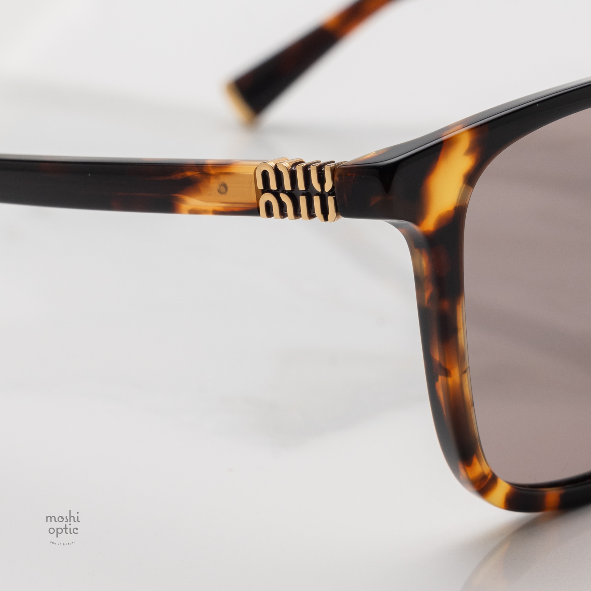 แว่นกันแดด Miu Miu MUB03SF 14L20I