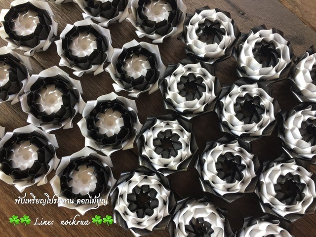 บัวสวรรค์ขาวดำ เหรียญโปรยทาน