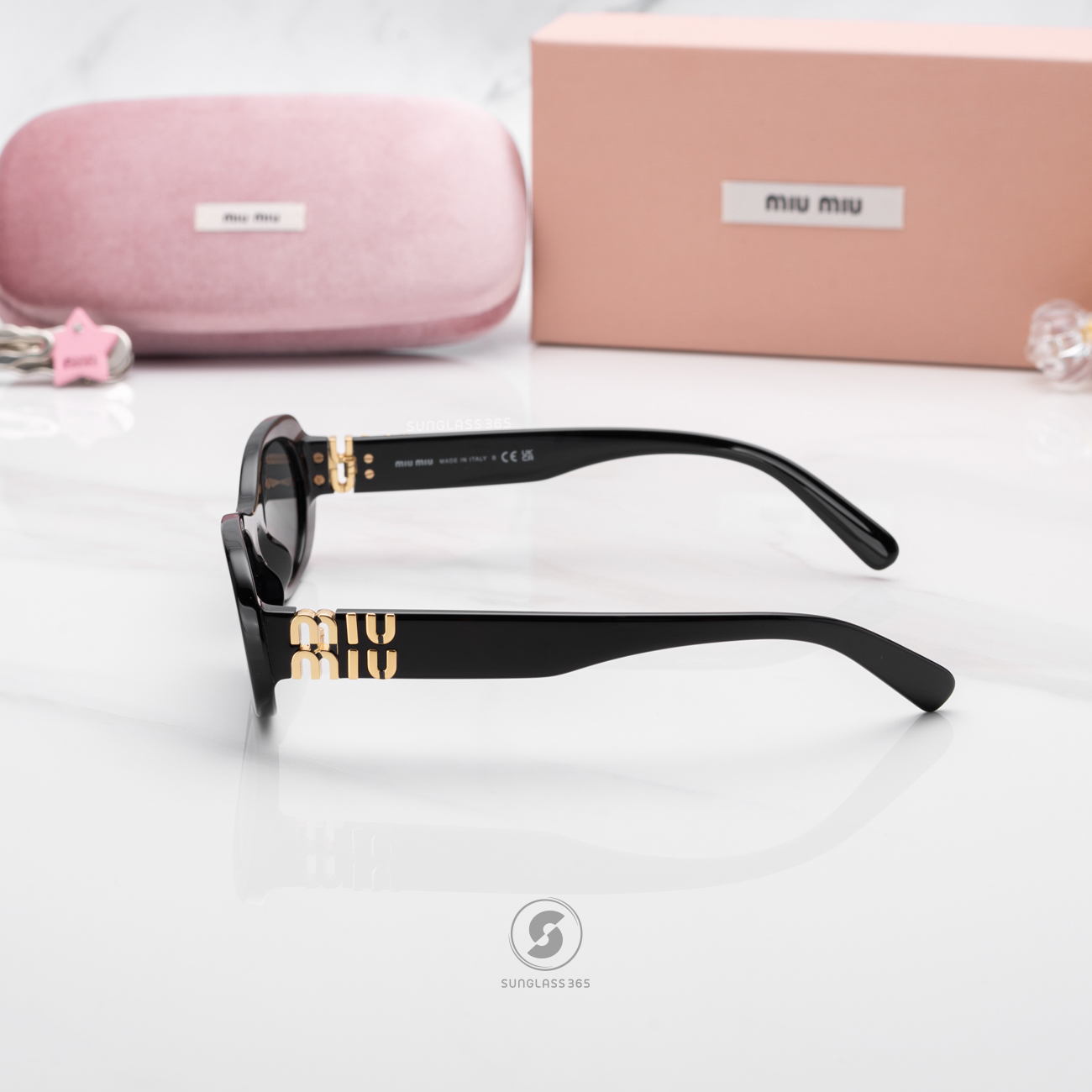 แว่นกันแดด Miu Miu MU06ZS 1AB5S0