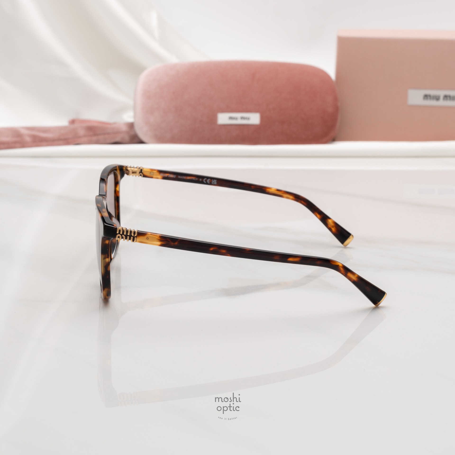 แว่นกันแดด Miu Miu MUB03SF 14L20I