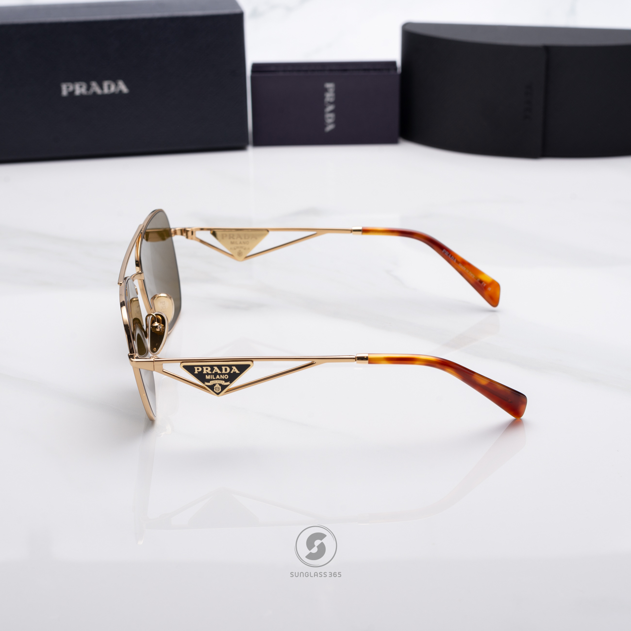 แว่นกันแดด PRADA PRA50S 5AK01T Gold