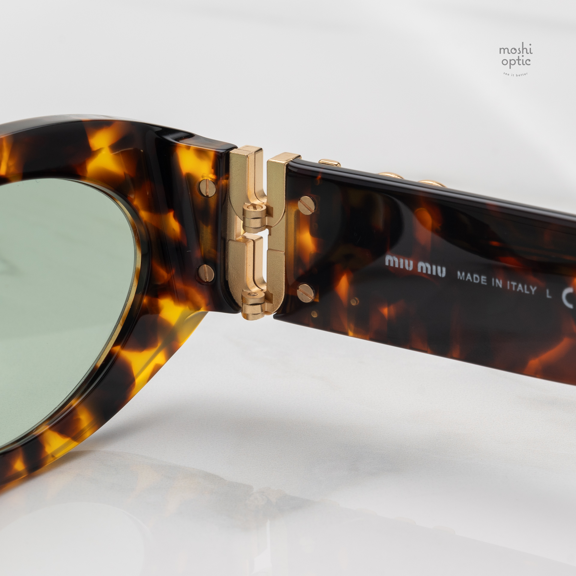 แว่นกันแดด Miu Miu Glimpse MU11WS 14L50O