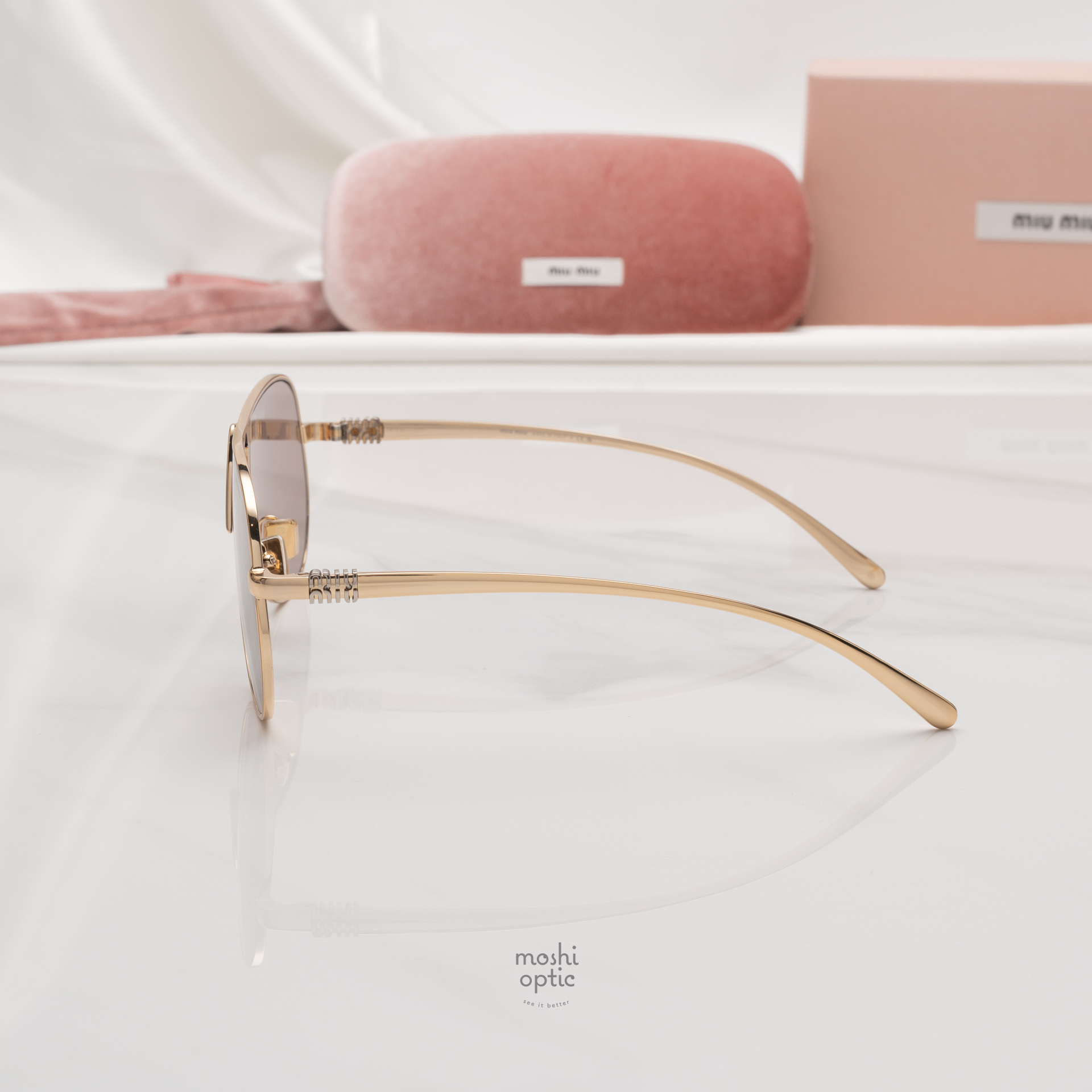 แว่นกันแดด Miu Miu MUA56S 5AK20I