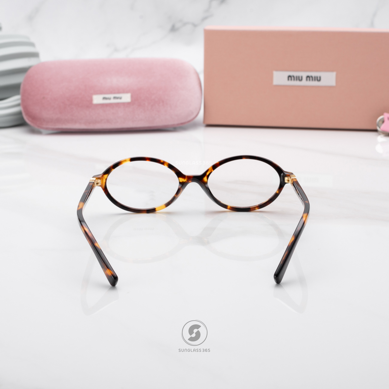 แว่นกันแดด Miu Miu MU04ZSF VAU08N