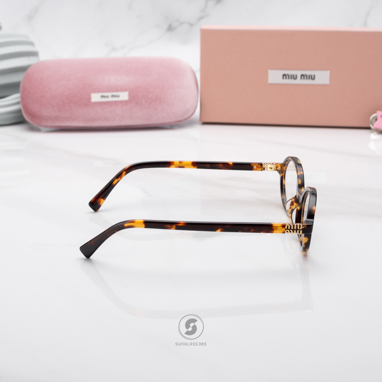 แว่นกันแดด Miu Miu MU04ZSF VAU08N