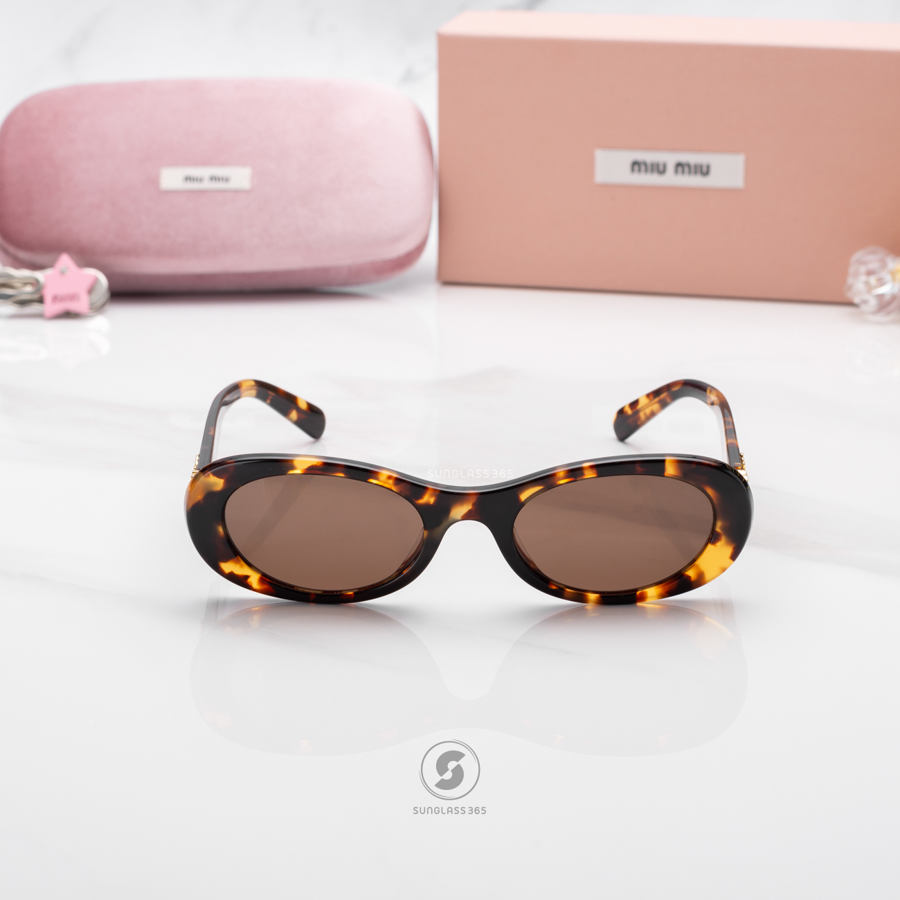 แว่นกันแดด Miu Miu MU06ZS VAU06B