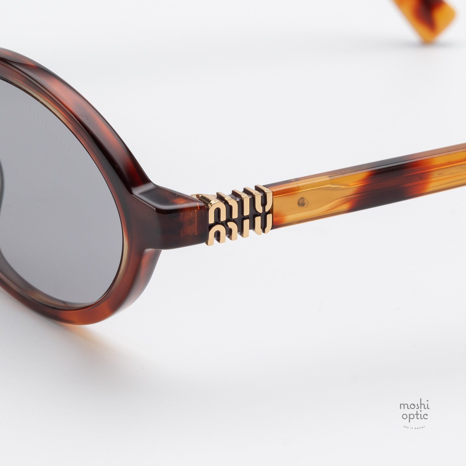 แว่นกันแดด Miu Miu MU04ZSF 21C40O