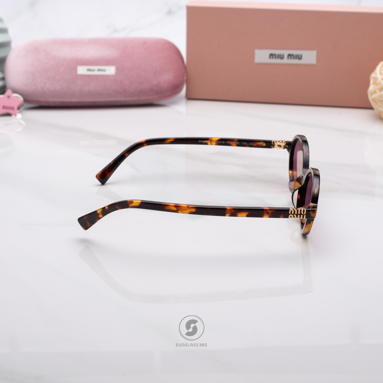 แว่นกันแดด Miu Miu MU04ZSF VAU50D