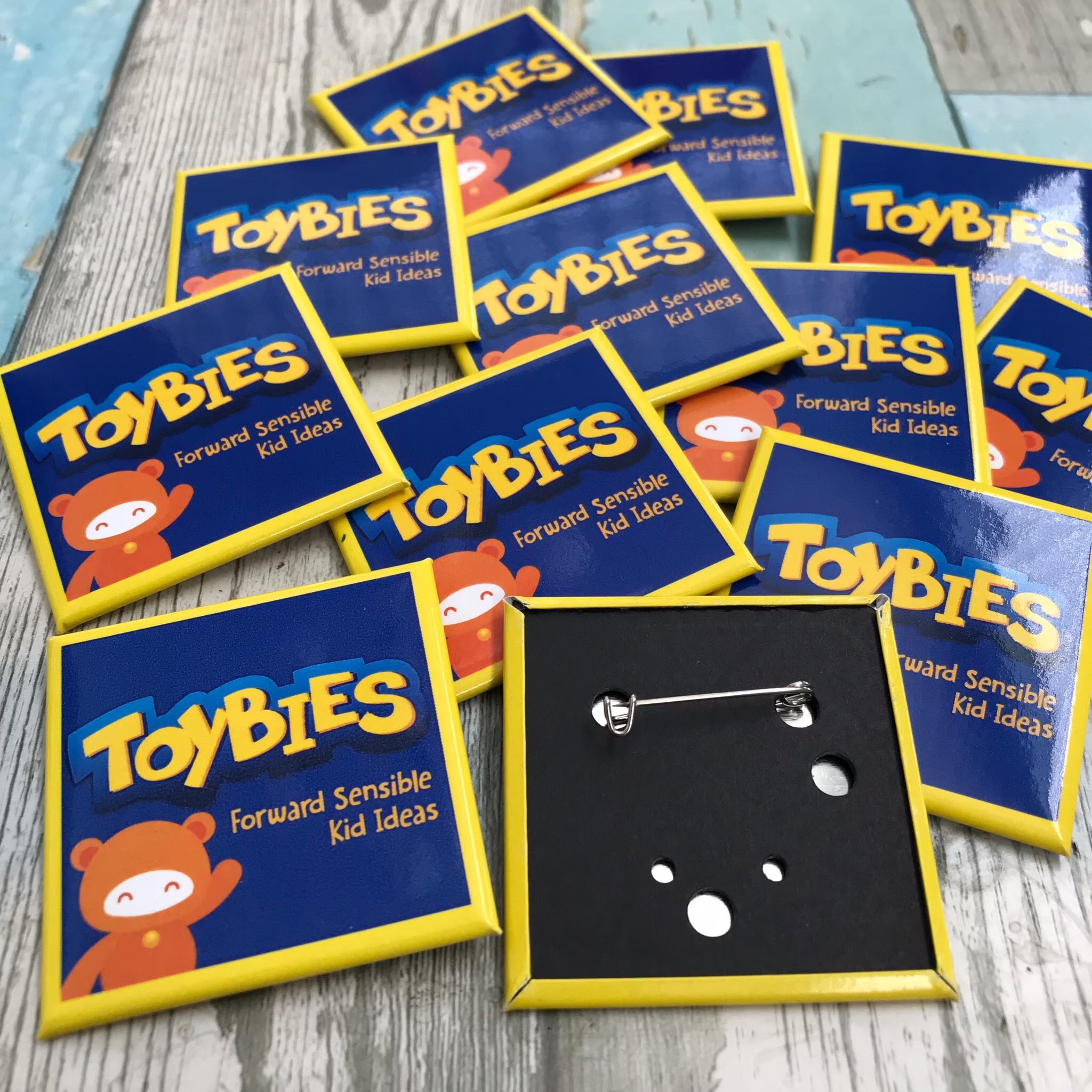 เข็มกลัดสี่เหลี่ยมจัตุรัส รับทําเข็มกลัดสี่เหลี่ยม