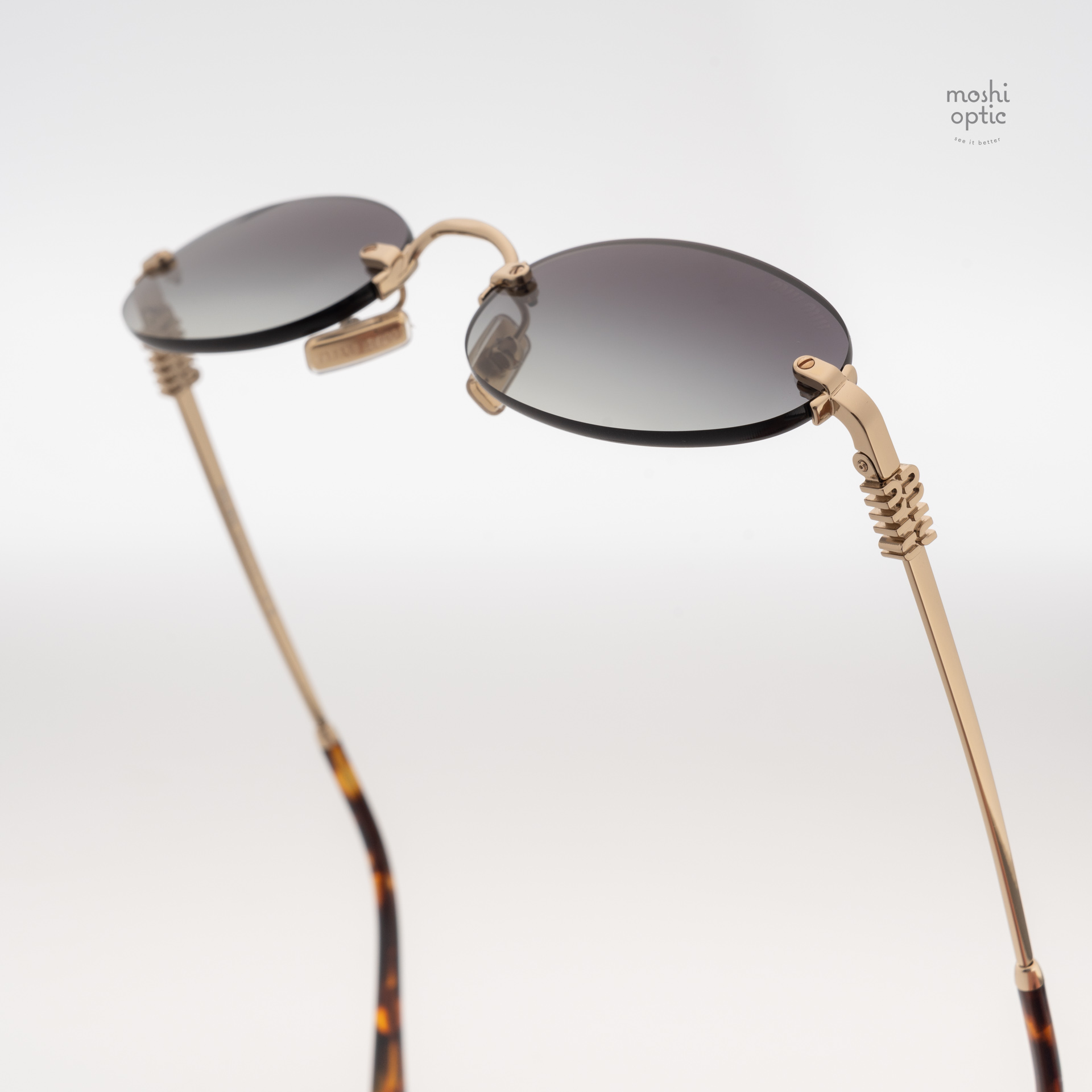 แว่นกันแดด Miu Miu MUA54S ZVN5D1