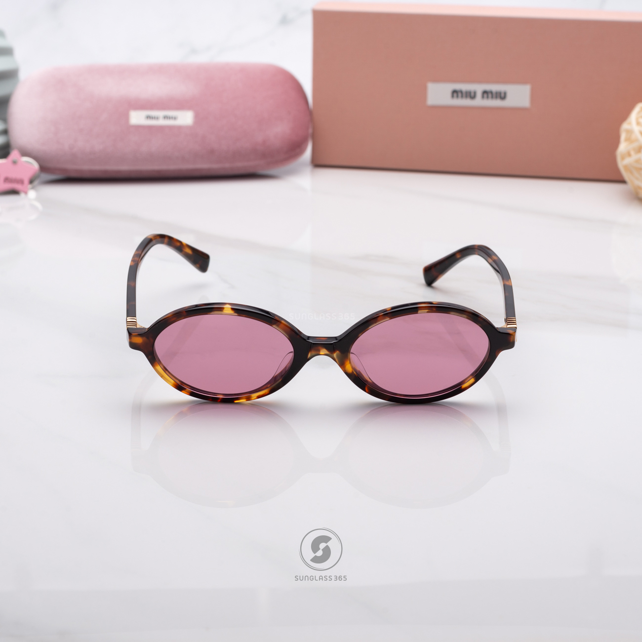 แว่นกันแดด Miu Miu MU04ZSF VAU50D