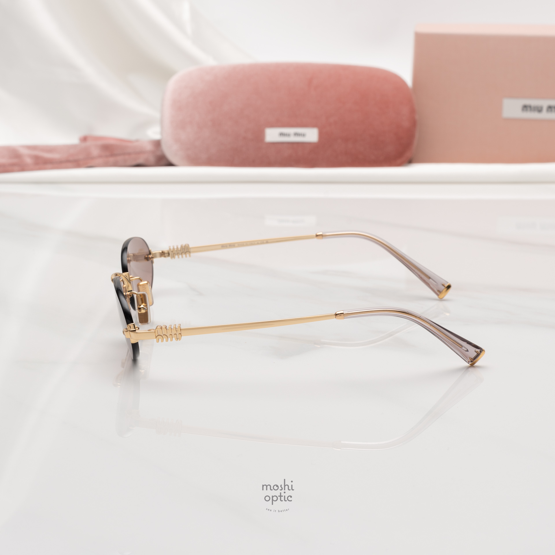 แว่นกันแดด Miu Miu MUA54S 5AK20I