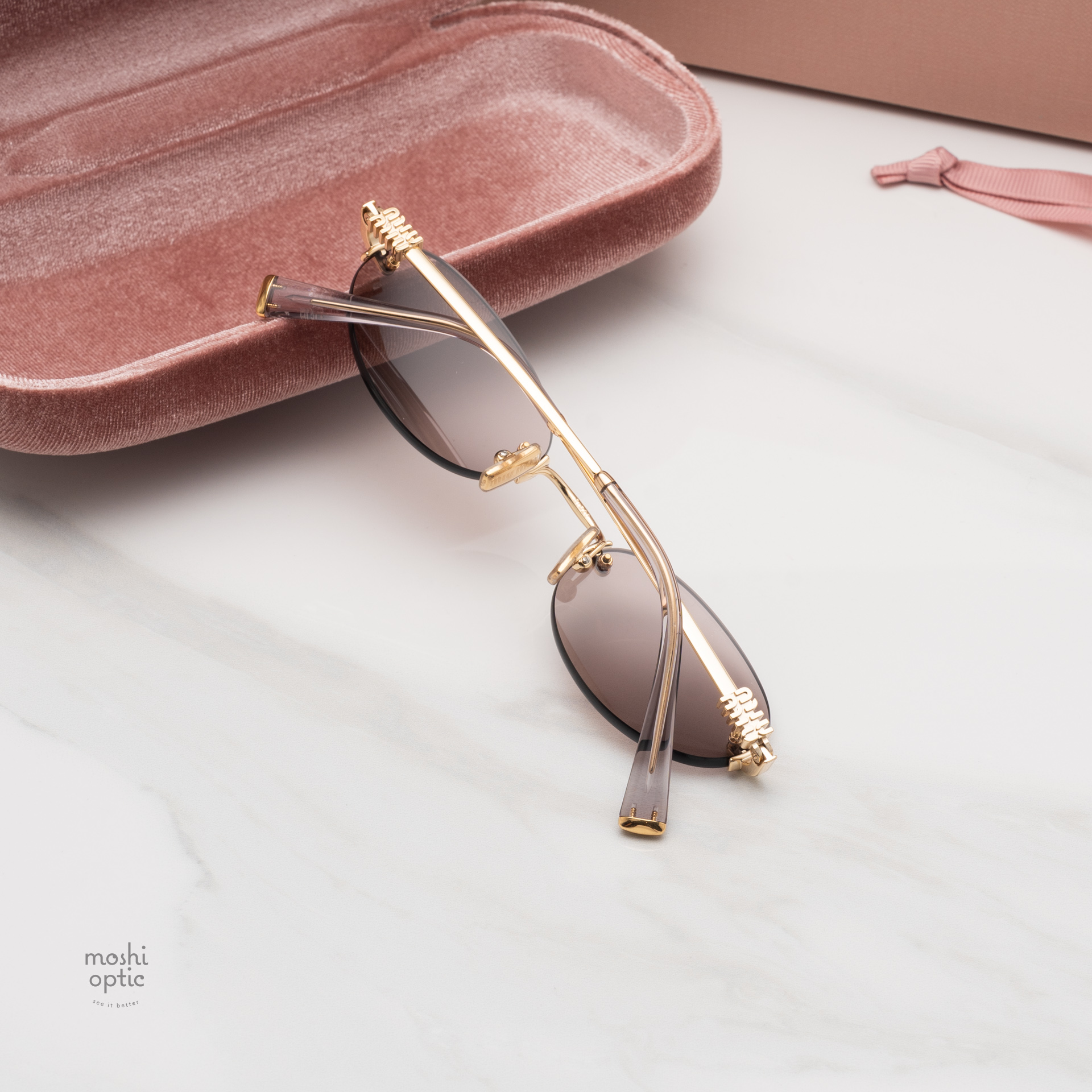 แว่นกันแดด Miu Miu MUA54S 5AK20I