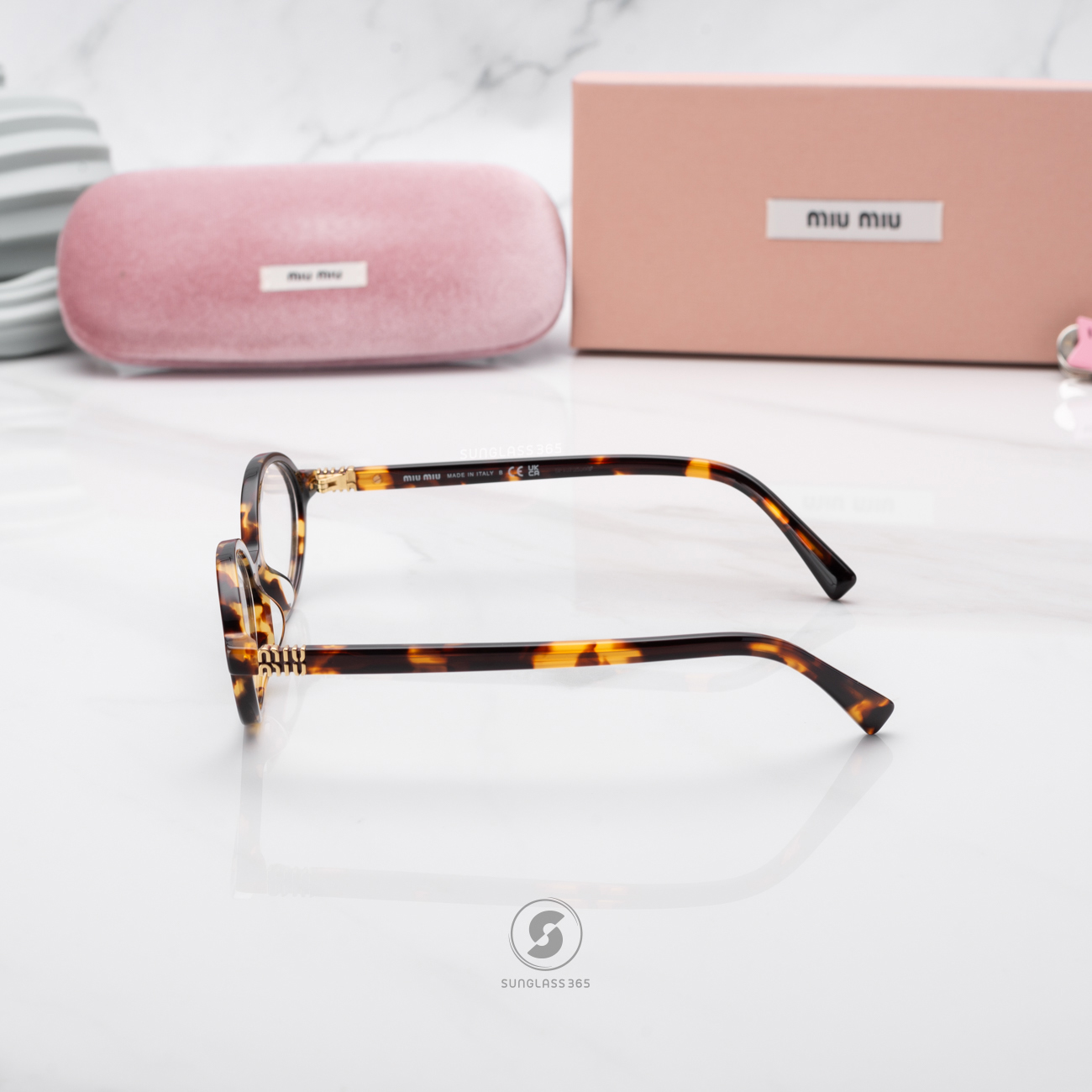 แว่นกันแดด Miu Miu MU04ZSF VAU08N