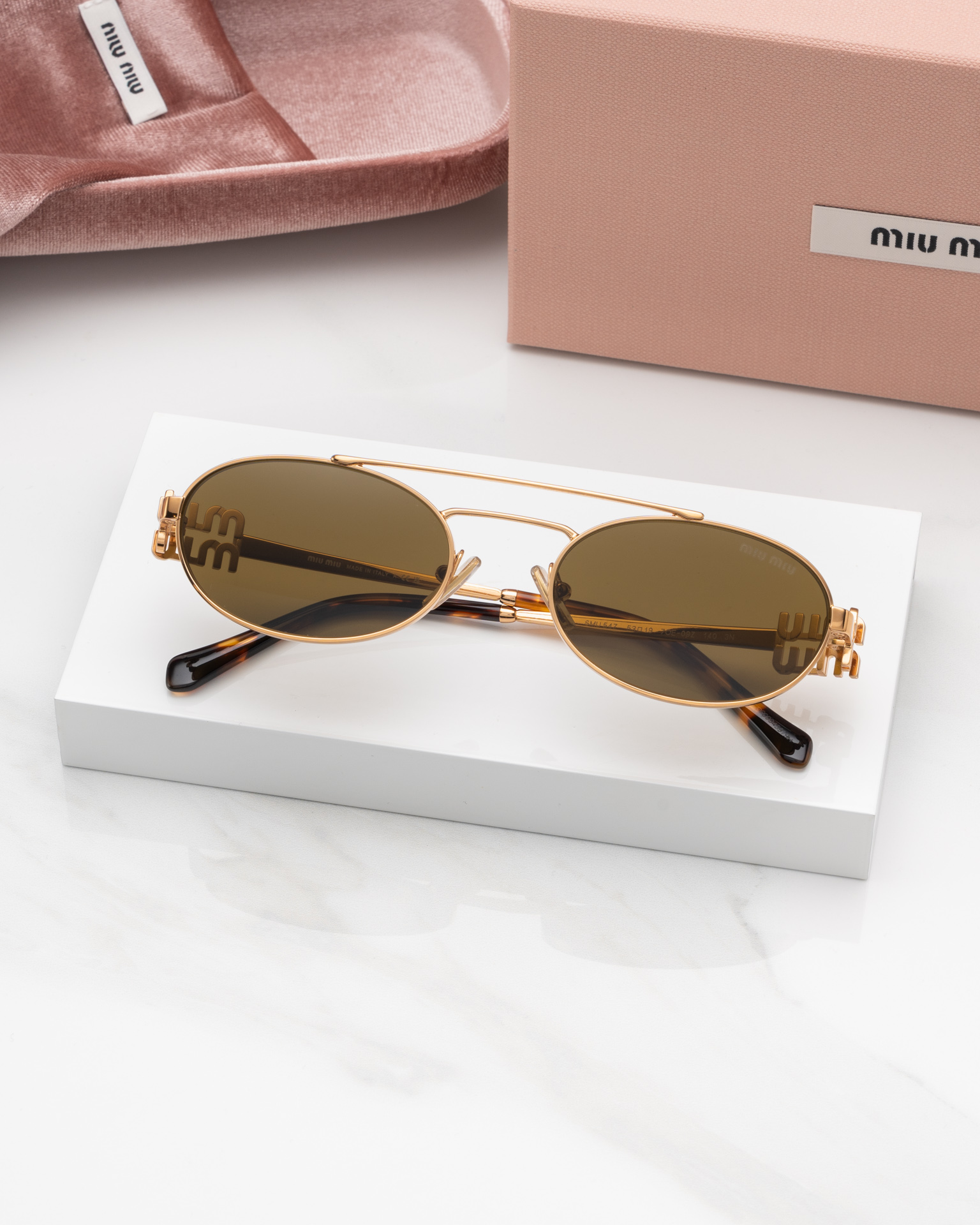 แว่นกันแดด Miu Miu MU54ZS 70E09Z