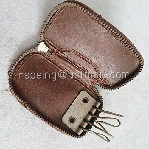 กระเป๋าพวงกุญแจหนังเก่า บริษัท สหเวชชภัณฑ์ประกันภัย จำกัด