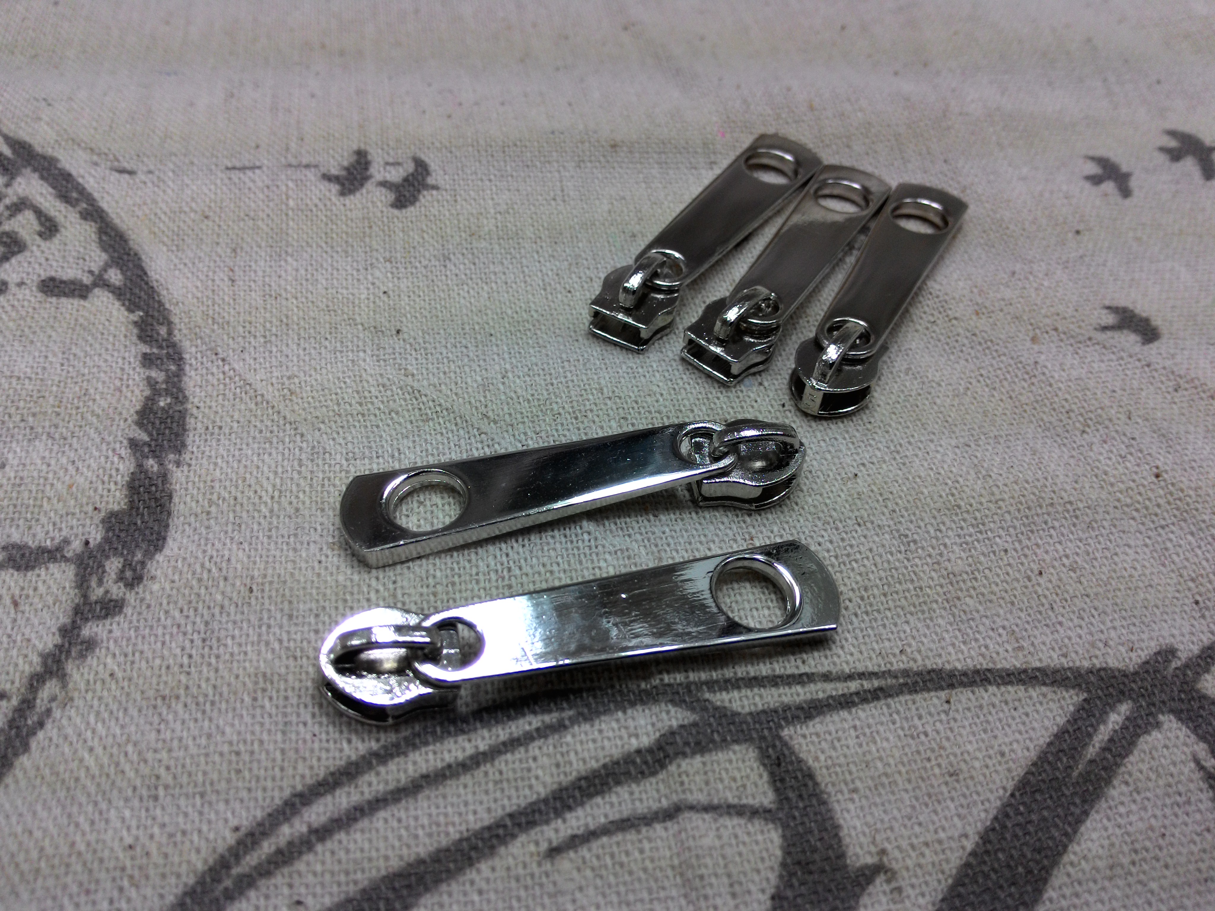 หัวซิบกีตาร์ยาว เงิน