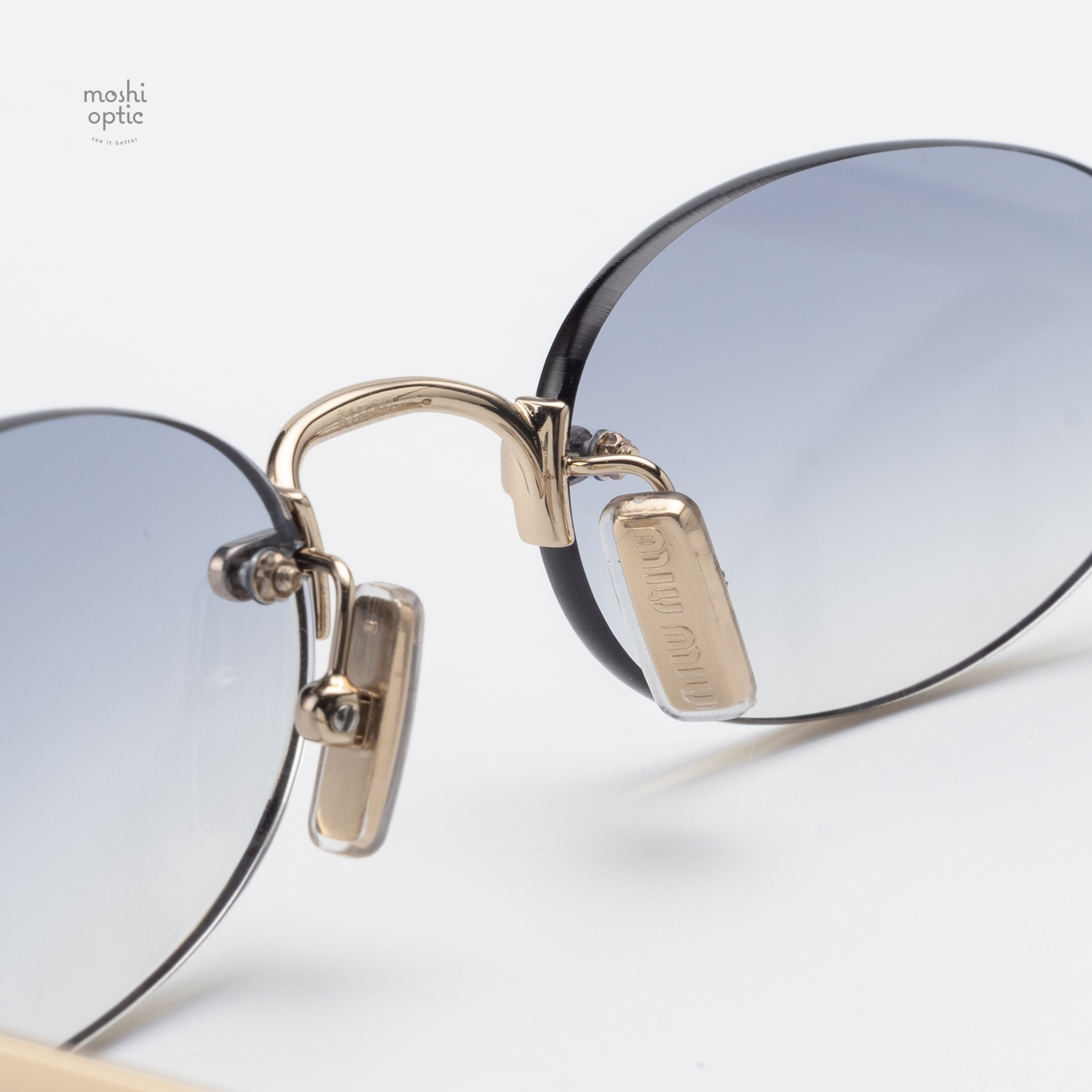 แว่นกันแดด Miu Miu MUA54S ZVN80O