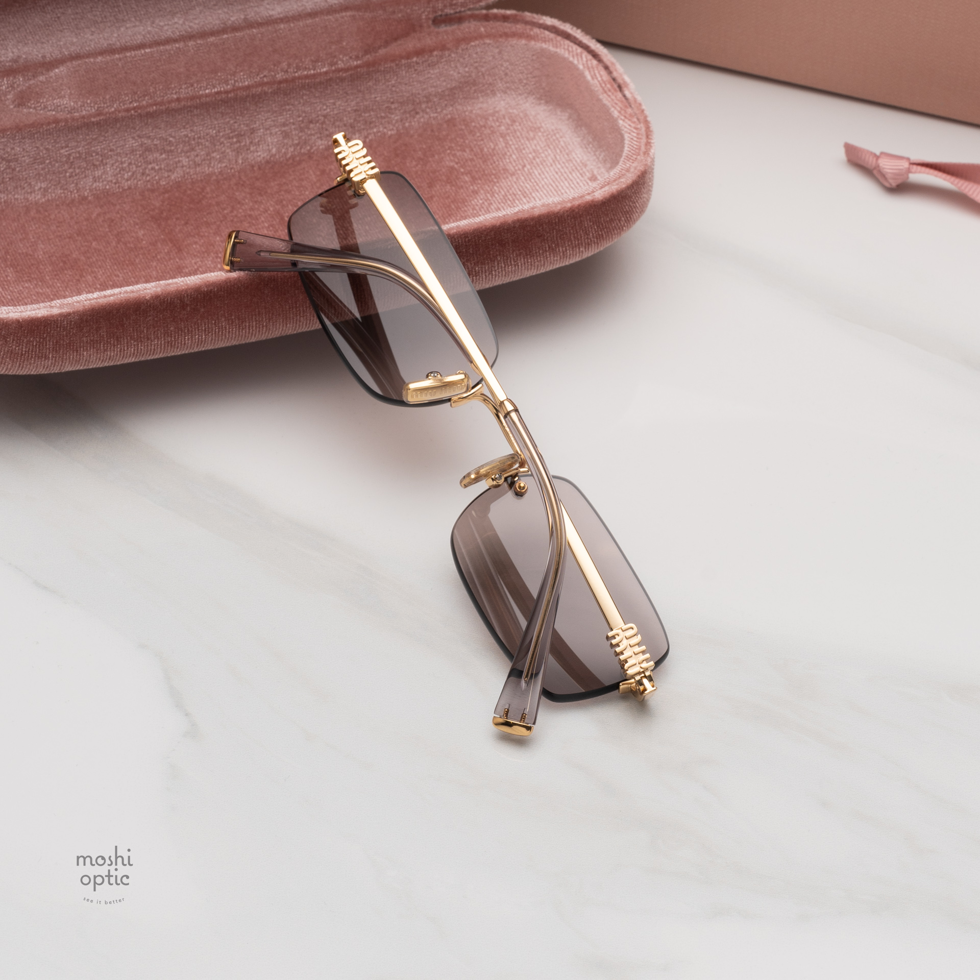 แว่นกันแดด Miu Miu MUB50S 5AK20I