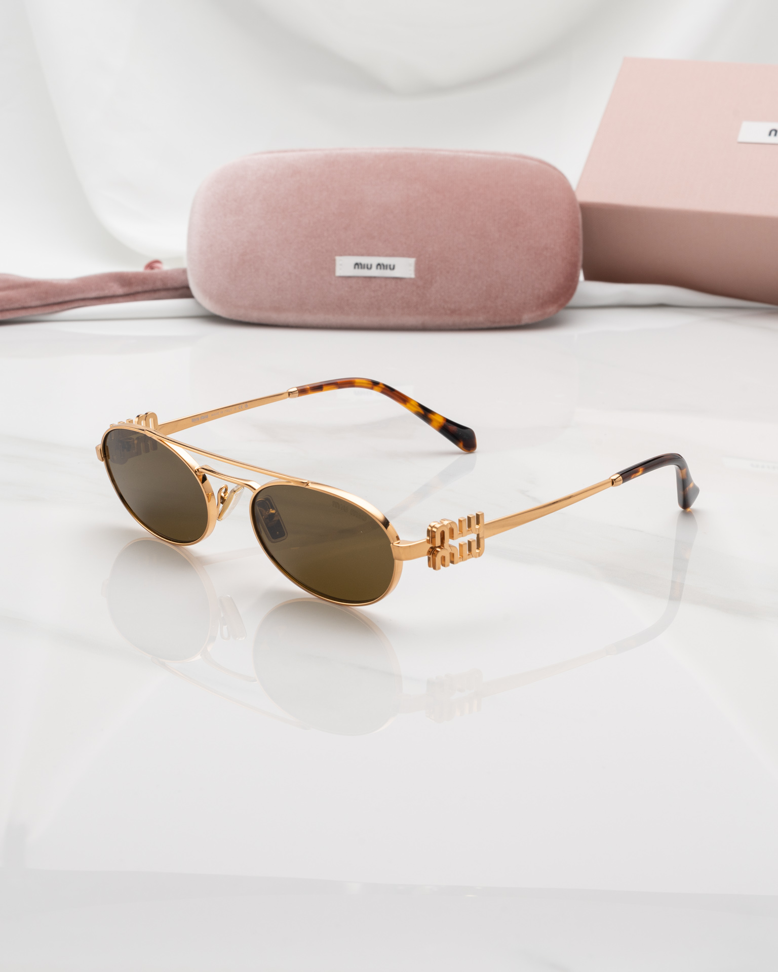 แว่นกันแดด Miu Miu MU54ZS 70E09Z