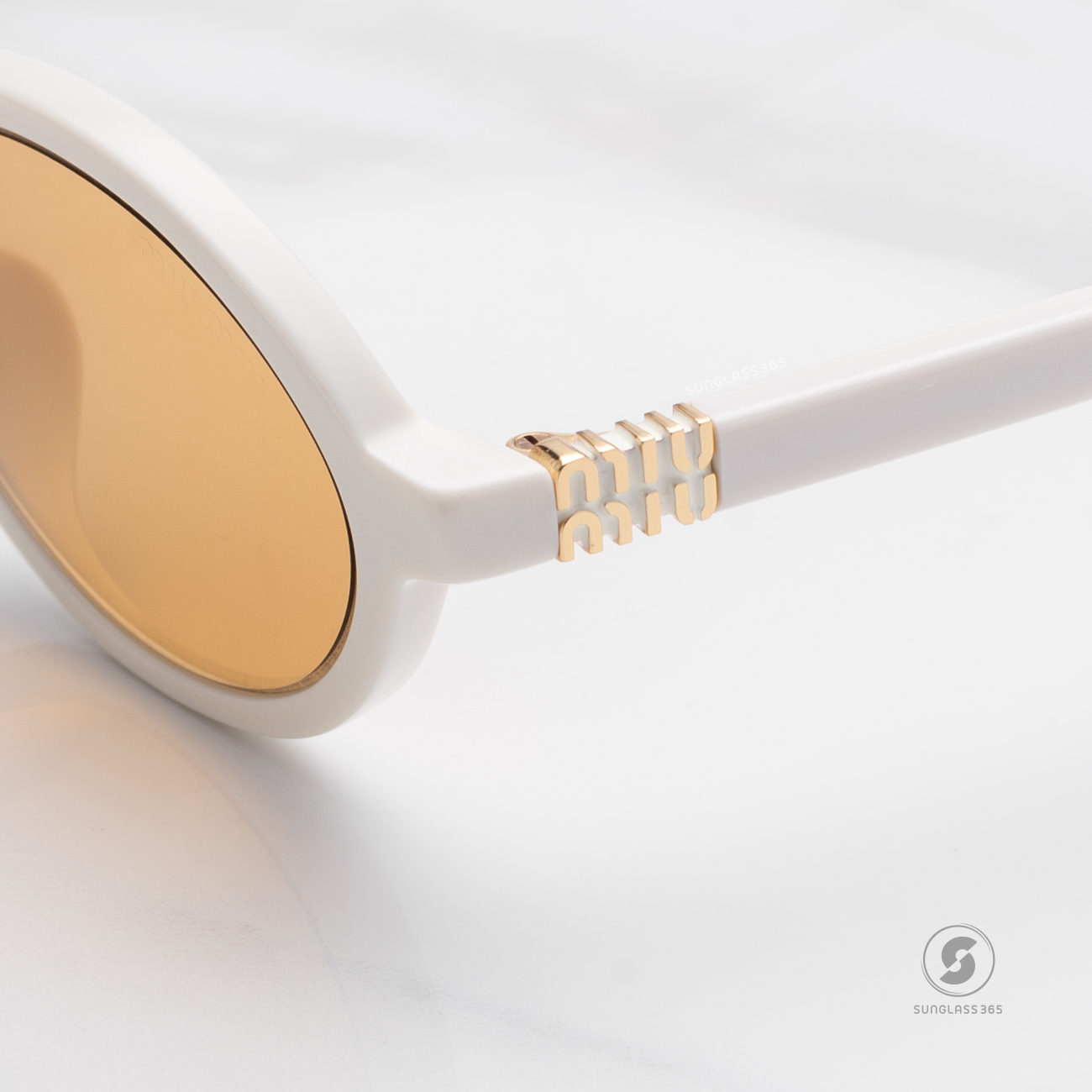 แว่นกันแดด Miu Miu MU04ZSF 14240D