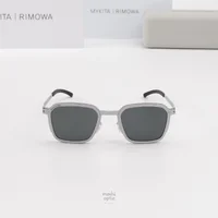 แว่นกันแดด MYKITA RIMOWA SUN MR002 AL2 WHITE SILVER SILVER DARKGREY SOLID แว่นกันแดด MYKITA RIMOWA SUN MR002 AL2 WHITE SILVER SILVER DARKGREY SOLID