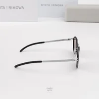 แว่นกันแดด MYKITA RIMOWA SUN MR001 AL1 WHITE SILVER BLACK COOLGREY SOLID แว่นกันแดด MYKITA RIMOWA SUN MR001 AL1 WHITE SILVER BLACK COOLGREY SOLID