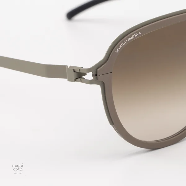 แว่นกันแดด MYKITA RIMOWA SUN MR006 AL5 CLAY GREEN CLAY GREEN RAWBROWN GRADIENT image 7 แว่นกันแดด MYKITA RIMOWA SUN MR006 AL5 CLAY GREEN CLAY GREEN RAWBROWN GRADIENT image 7